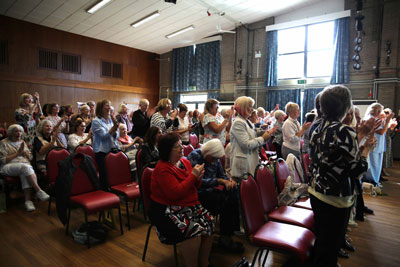 Standing ovation from the 2026 AGM audience after Julia's 'A Floral Scottish Tapestry' Demonstration
