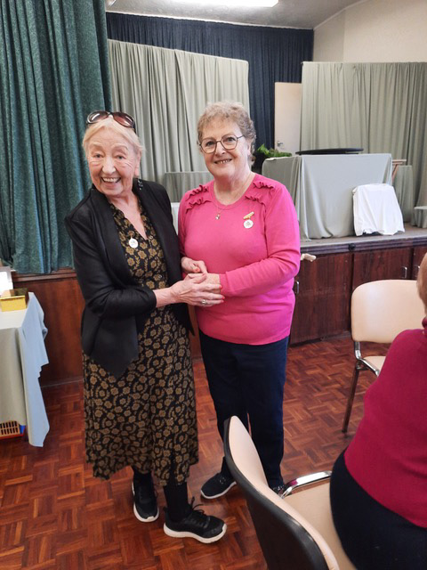 Stockport Afternoon Club's new chairman Mary Brownhill, left, receiving her badge of office from our president, Dorothy Prydderch